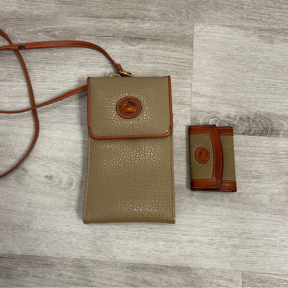 Dooney and Bourke All weather leather Crossbody wallet with keychain holder wall